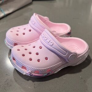 CROCS Kids Light Pink Clogs with Iridescent Sole